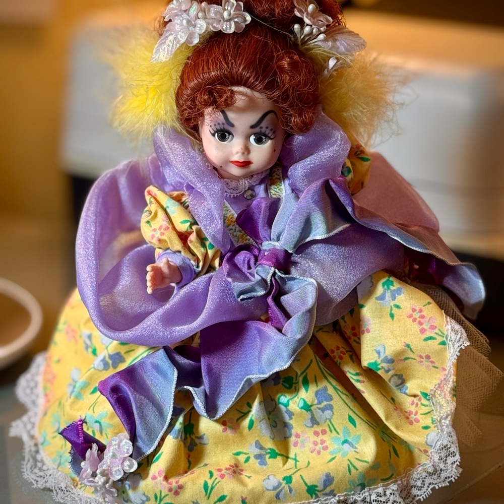 Madame Alexander Very Ugly Stepsister Doll in Yellow and Purple Floral Dress.